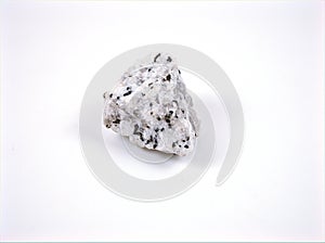 A small piece of Lgneous rock ,Grafiitti ,Spinelli isolated on white background ,white stone photo