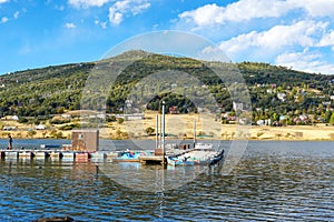 Small pier with little boat at Lake Cuyamaca, California, USA