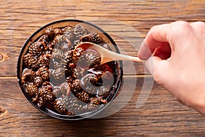 Small pine cones in sugar syrup