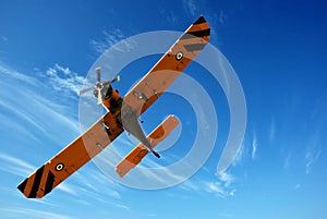 Small plane in blue sky