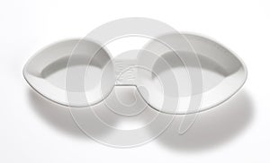 Small plastic drug dosing spoon isolated with clipping path