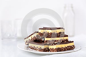 A small plate of Nanaimo bars - a traditional Canadian dessert