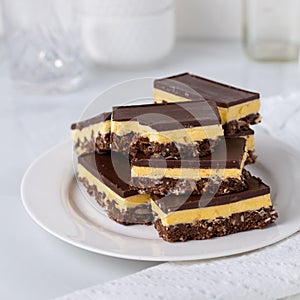 A small plate of Nanaimo bars - a traditional Canadian dessert