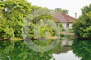 Small pond and house