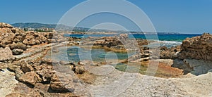 Small pool with sea water surrounded by rocks