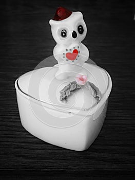 small porcelain heart-shaped box with little owl on the lid, with red heart, pink rose and burgundy hat