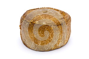 Small pork pie isolated on white