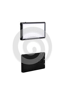 A small portable LED panel on the battery. Lighting device for photo and video filming. Isolate on a white back