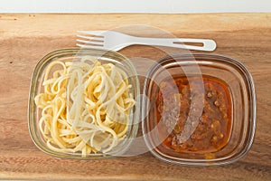 A small portion of linguini pasta and pasta tomato