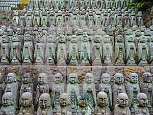 Small praying monk statues at Hase Dera Temple in Kamakura