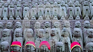 Small praying monk statues at Hase Dera Temple in Kamakura