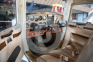 Small private plane pilot cabin with avionics equipment photo
