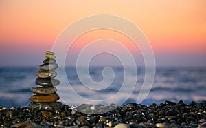 Small pyramid from stones on seacoast