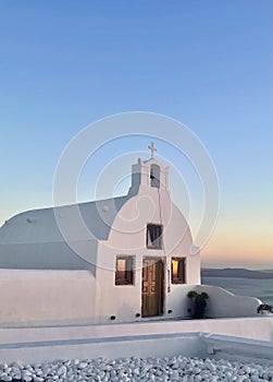 Small Quaint Chapel in Santorini Greece During Sunset