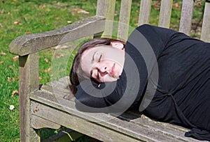 Small quiet nap on a bench