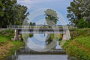 Small railroad bridge over water chanell