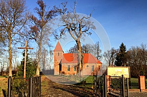 Small red brick village church in Boleszewo Poland