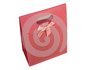 Small red gift bag isolated