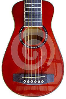 Small red guitar body on white background
