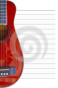 Small red guitar body on white paper note