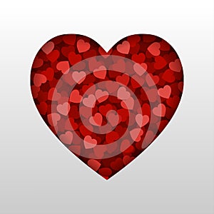 A small red hearts in heart shape frame on white background