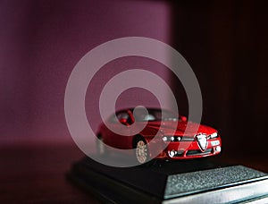 Small red metal Alfa Romeo Brera model