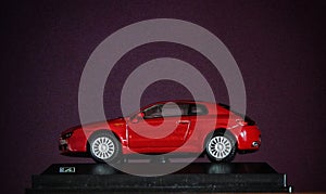 Small red metal Alfa Romeo Brera model photo