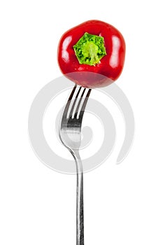 Small red pepper on a fork