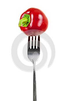 Small red pepper on a fork