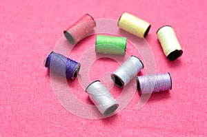 Small reels of sewing thread