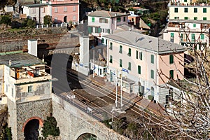 Small regional train station, located between mountains, at Riomaggiore town in Cinque Terre national park, Italy