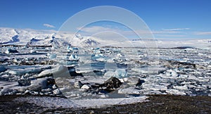 small remains of an iceberg floating in the sea