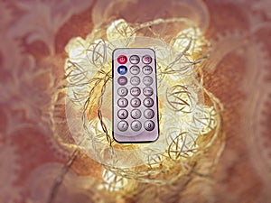 Small remote control on blurry background