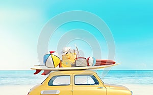 Small retro car with baggage, luggage and beach equipment on the roof, fully packed, ready for summer vacation