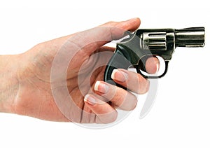 Small revolver gun in female hand