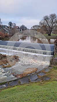 A small river dam, a water reservoir in the small town
