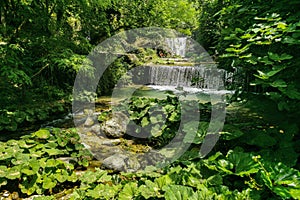 Small river in nature near the town of Campagna, Campania region, Italy. photo