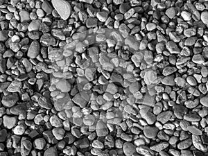 Small river sea stones. summer background. black and white pebble stone matrerial
