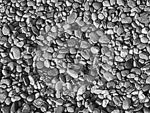 Small river sea stones. summer background. black and white pebble stone matrerial