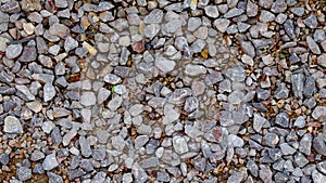 Small rock decorated as ground way