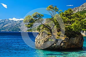 Small rock island in the sea in Dalmatia, Brela, Croatia