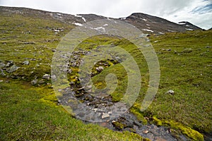 A small, rocky mountain stream in Sarek National Park, Sweden.