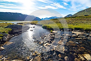 A small, rocky mountain stream in Sarek National Park, Sweden.