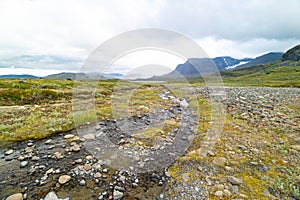 A small, rocky mountain stream in Sarek National Park, Sweden.