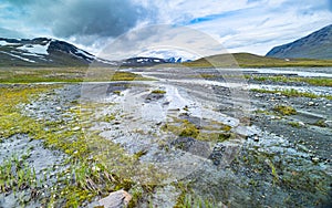 A small, rocky mountain stream in Sarek National Park, Sweden.