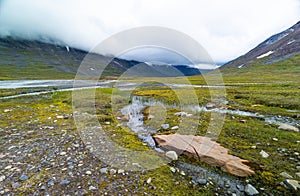 A small, rocky mountain stream in Sarek National Park, Sweden.