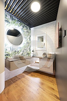 small room with modern wash basin for freshening up with wooden floor