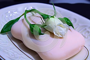 Small rose under soap.