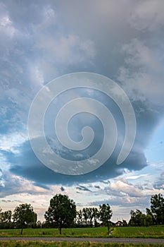 Small rotating thunderstorm over the countryside