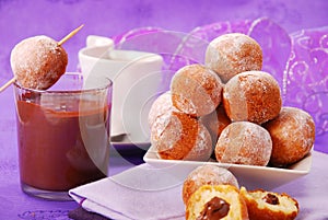 Small round donuts with chocolate filling